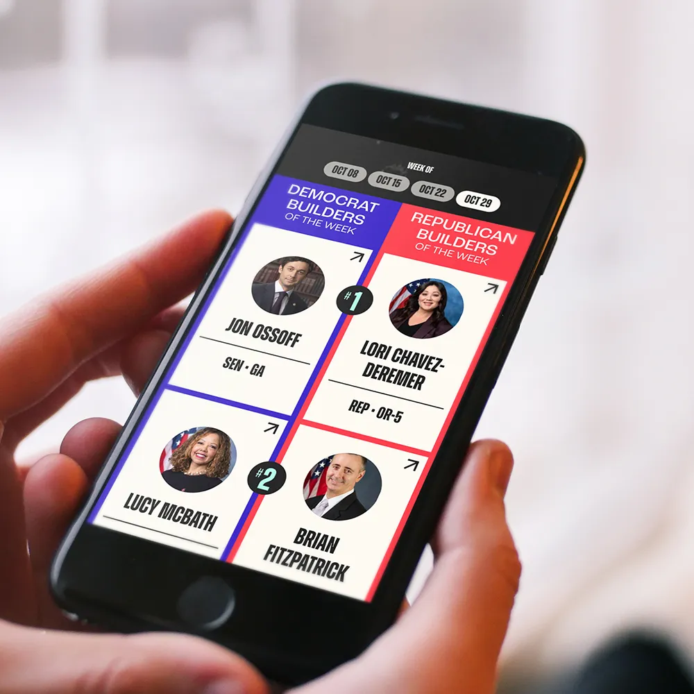 Person holding a phone displaying a political app with "Democrat" and "Republican Builders of the Week" featuring four politicians.